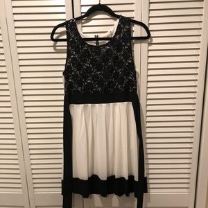 Black and white dress, just above knee
